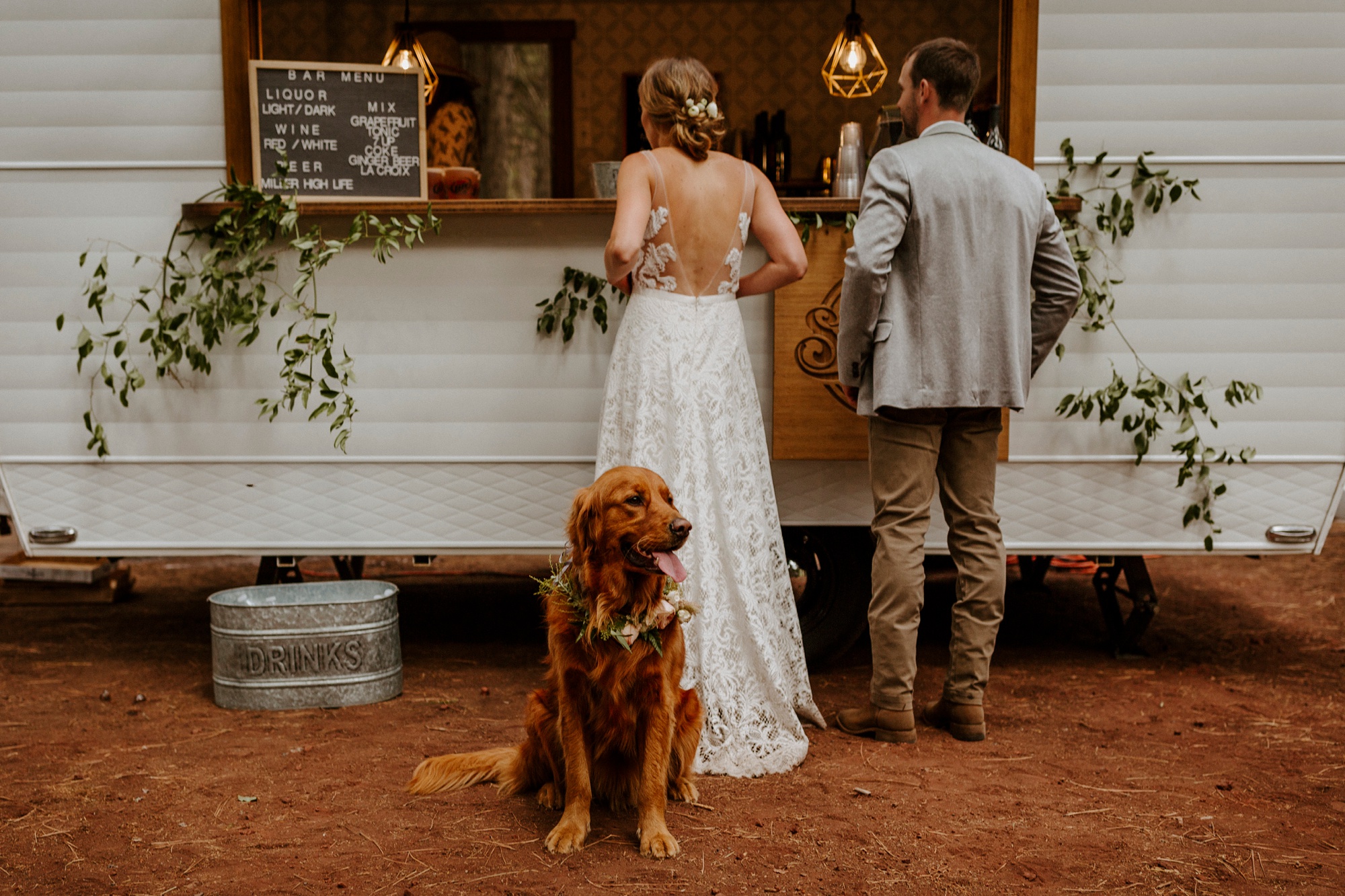 campground wedding central oregon bend outdoor adventure summer golden retriever dog swig rig drink bar trailer