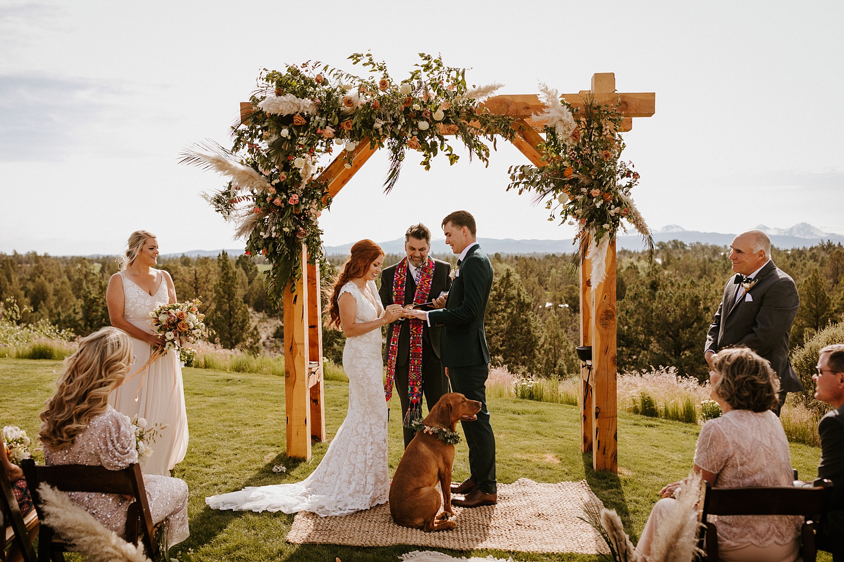 bend oregon neutral color high desert wedding ceremony mountain views dog puppy